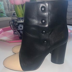 Black buttoned booties